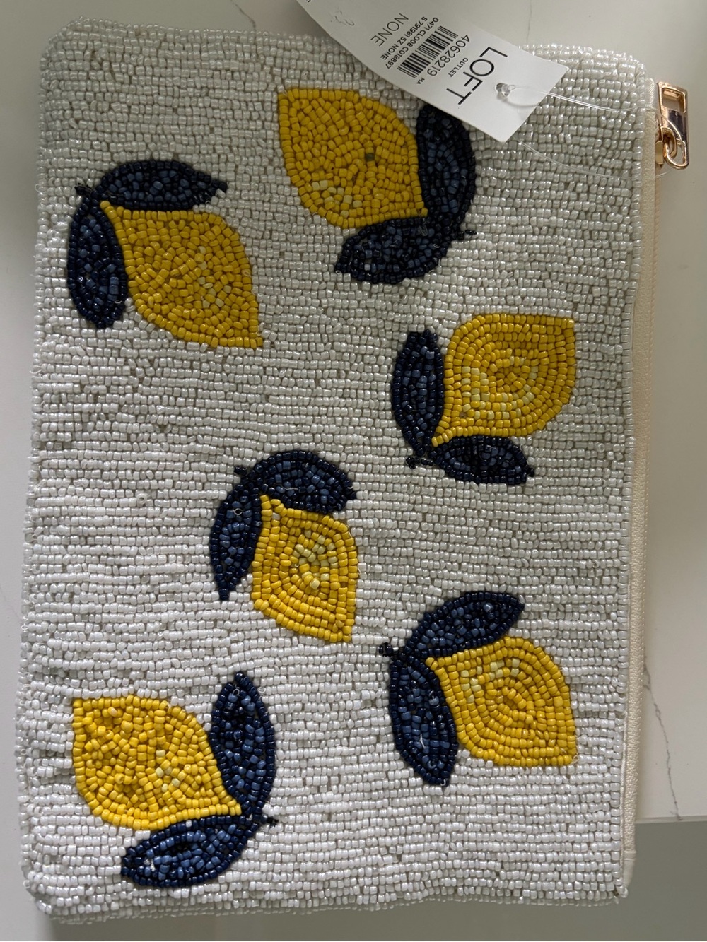 LOFT White Beaded Clutch with Yellow & Navy Leaf Motif